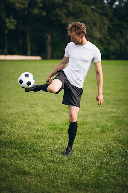 Young football player at the football field