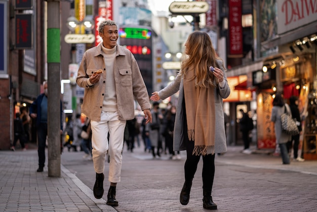 Young friends traveling through japan