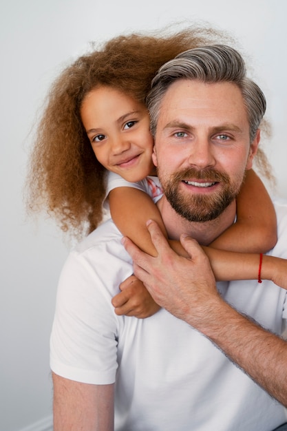 Free photo young girl adopted by couple