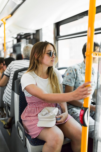 Free photo young girl on the bus