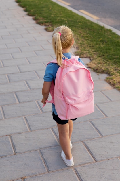 Free Photo young girl getting back to school