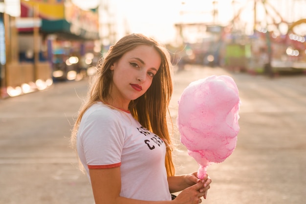 Free Photo young girl having fun in the amusement park