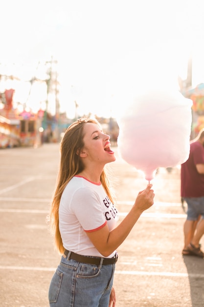 Free Photo young girl having fun in the amusement park