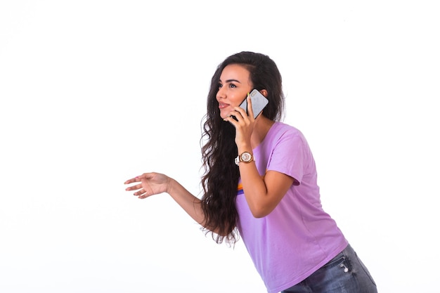 Young girl having a phone call and talking