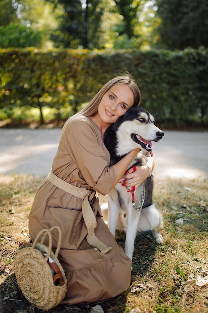 Young girl and husky