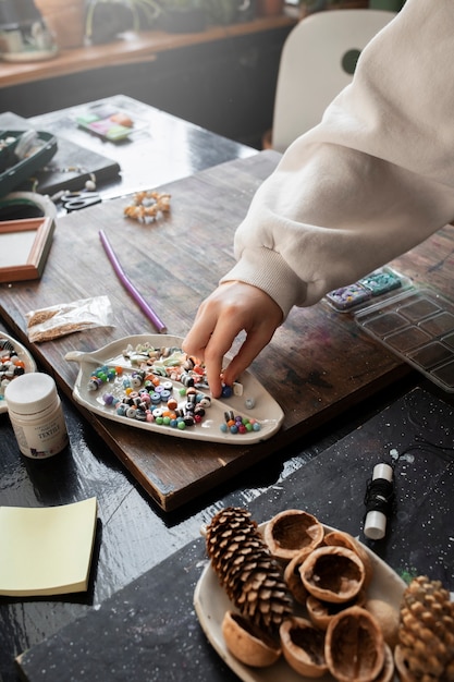 Young girl making diy crafts in upcycle project