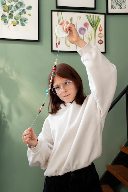 Young girl making diy crafts in upcycle project