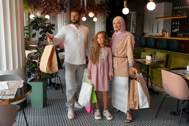 Young girl out for a shopping session with her parents