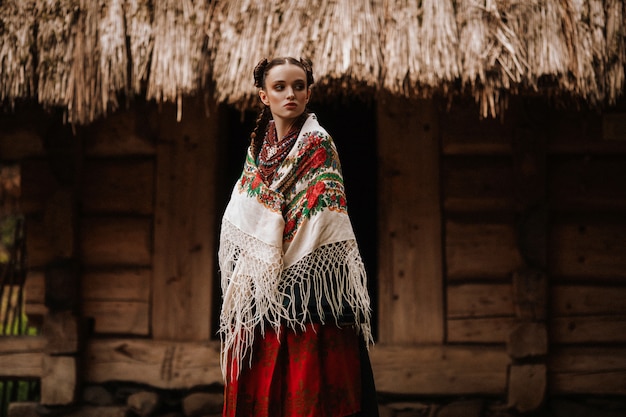 Young girl poses in Ukrainian dress