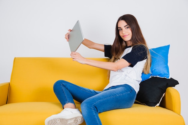 Young girl posing with her ipad