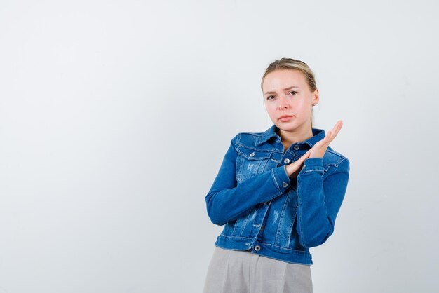 Young girl showing a counting money hand on white background