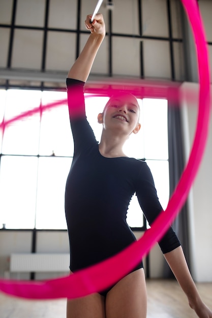 Young girl training in gymnastics