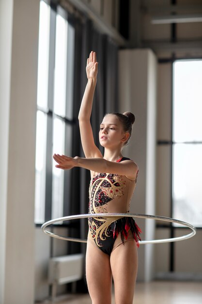 Young girl training in gymnastics