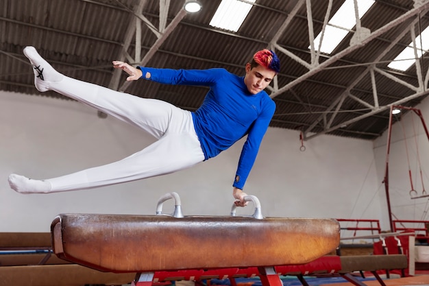 Free Photo young gymnast training for competition