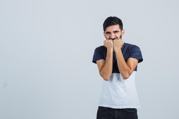 Young handsome man in a casual t-shirt