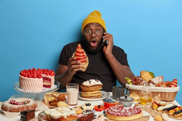 Young handsome man enjoying a wholesome dinner