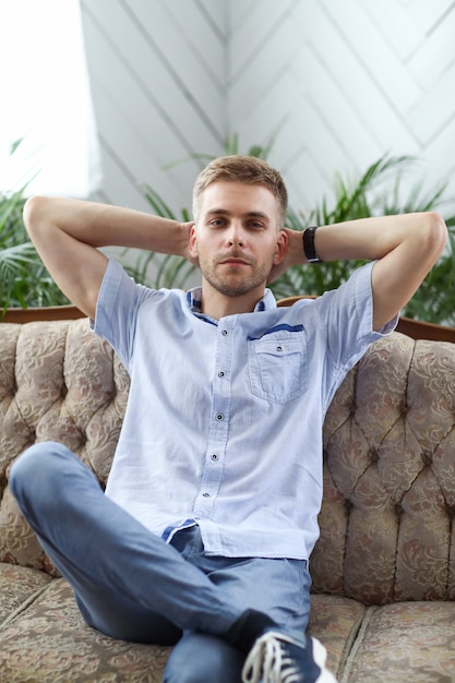 Free photo young handsome man posing