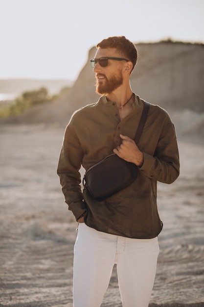 Young handsome man in a quarry alone