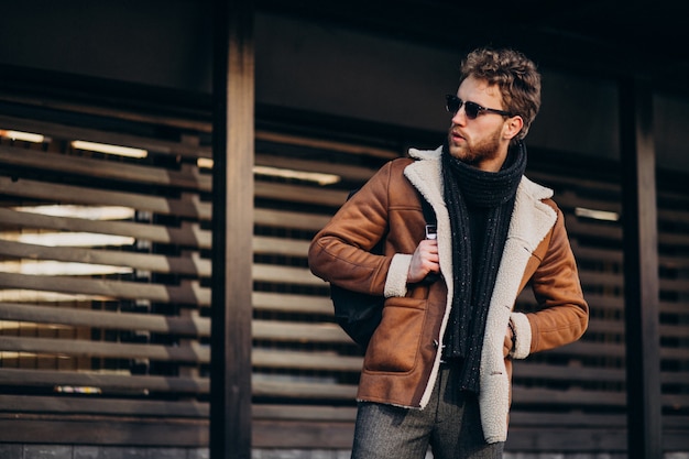 Free Photo young handsome man in a street outfit