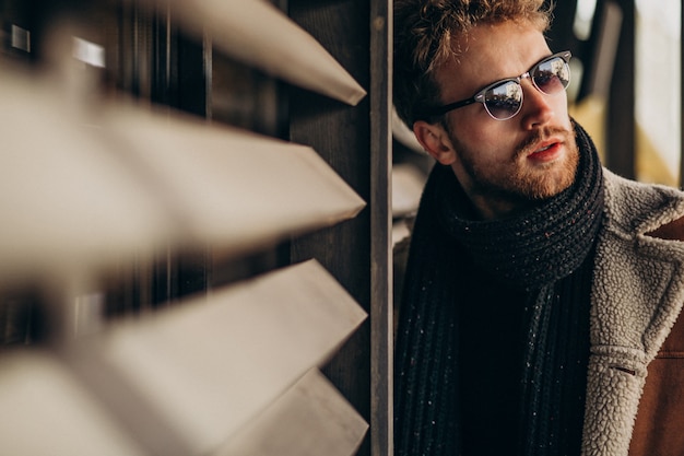 Young handsome man in a street outfit