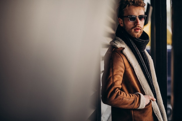 Free Photo young handsome man in a street outfit