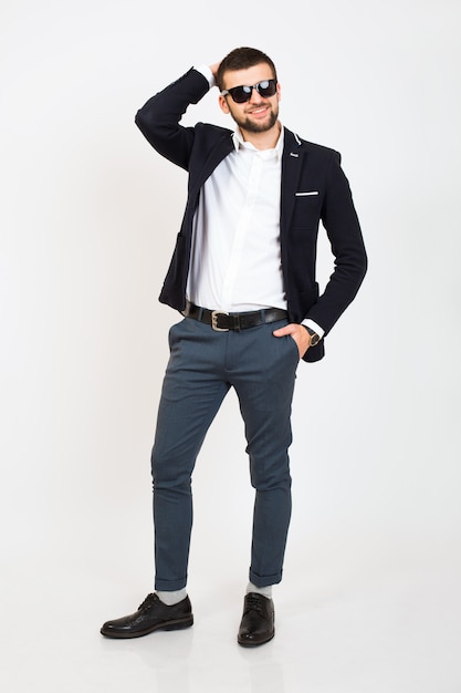 Young handsome stylish hipster man in black jacket, business style, white shirt, isolated, standing on white background, smiling, attractive, full height, looking confident and cool