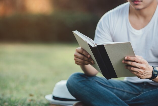 Young Hansome man Reading Book