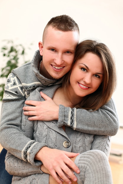 young happy couple at home