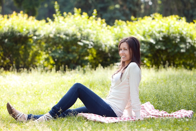 Young and happy girl in the park