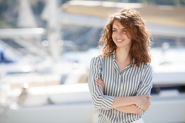 Free photo young happy woman outdoors