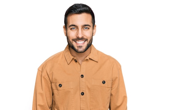 Free Photo young hispanic man wearing casual clothes with a happy and cool smile on face lucky person