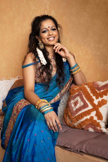 Free photo young indian woman wearing sari