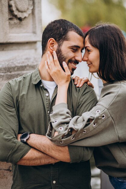 Young international couple together in park