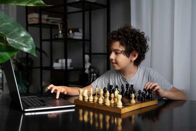 Young kid playing chess