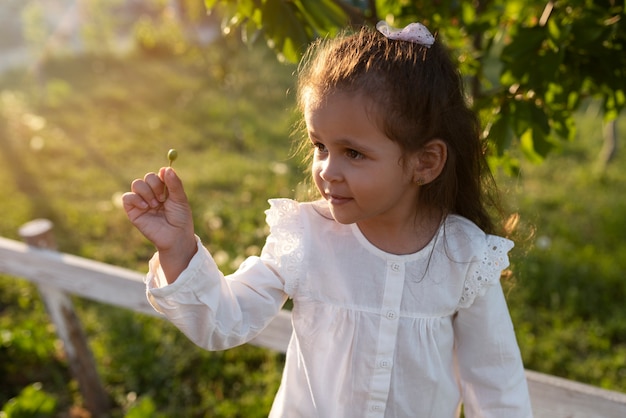 Young kid spending time in nature