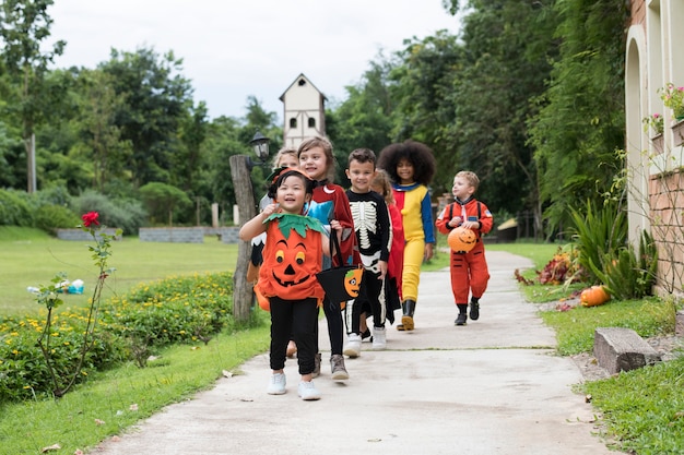 Young kids trick or treating during Halloween