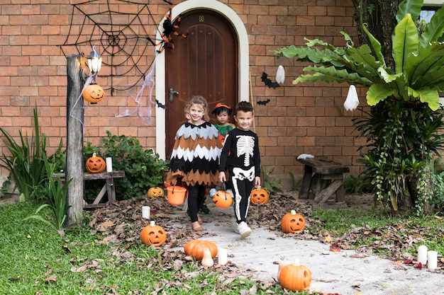 Young kids trick or treating during Halloween