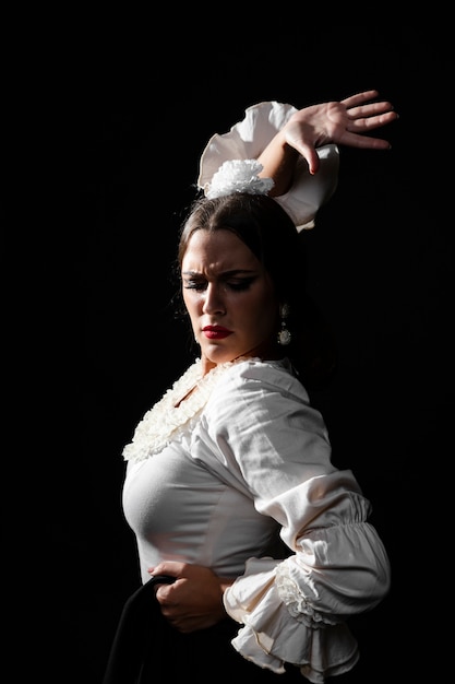 Free Photo young lady dancing flamenco gracefully 