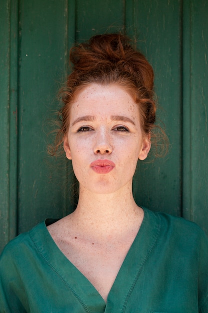 Young lady making a duck face for camera