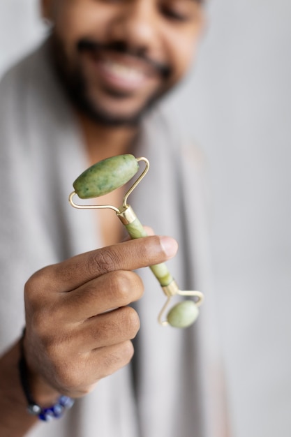 Young male doing selfcare routine