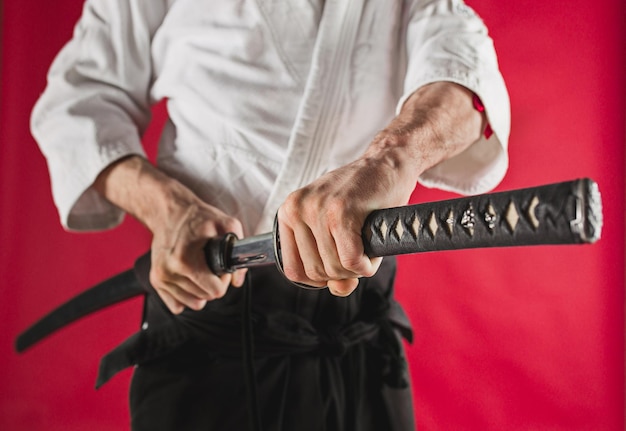 Free Photo the young man are training aikido at studio