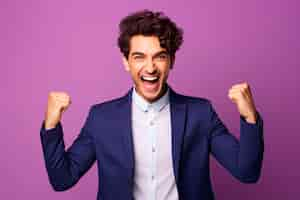 Free photo young man brown bob hair team leader celebrate victory competition on purple background