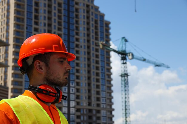 Young man civil engineer in safety hat