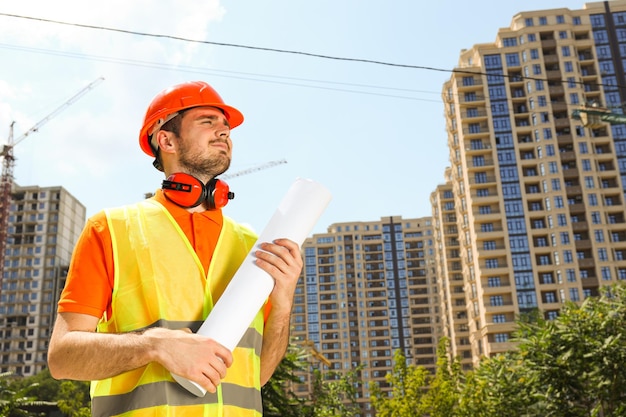 Young man civil engineer in safety hat