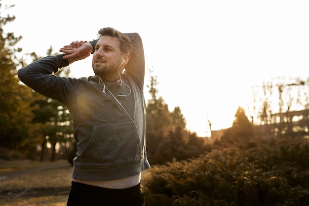 Young man exercising outdoors in the park