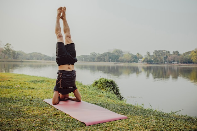 Young man handstanding