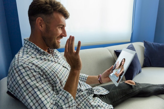 Free photo young man having a videoconference