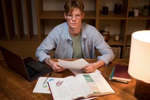 Young man learning in a virtual classroom