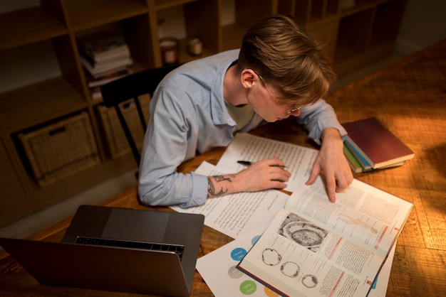 Young man learning in a virtual classroom