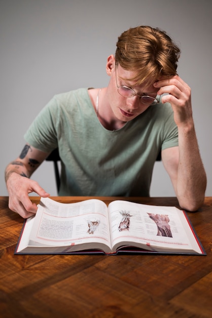 Young man learning in a virtual classroom